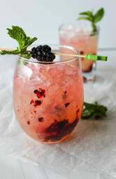 Honey Blackberry Mint Mocktail. A fruity mocktail with honey, blackberries, mint, lime, and sparkling water, served over ice for a fizzy, refreshing sip. (₩10,000)