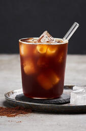 Iced Americano. A bold, refreshing boost, the Iced Americano blends smooth espresso with ice for a crisp, energizing sip—perfect for keeping up with the night’s rhythm. (₩5,000)