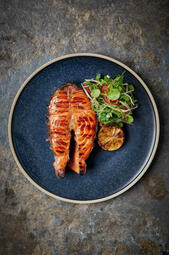 Soy Salmon Steak. Seared salmon steak glazed with savory soy sauce, served with roasted lemon and a refreshing salad for a balanced, flavorful dish. (₩40,000)