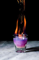 The Phoenix. The Phoenix cocktail blends gin and elderflower for a stunning purple gradient, shimmering finish, and a floral, refreshing taste, topped with a hint of fire. (₩20,000)