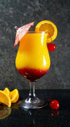 Tequila Sunrise. A vibrant cocktail with tequila, orange juice, and grenadine, offering citrusy sweetness and a smooth, refreshing sip. (₩15,000)