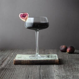 The Black Heart Cocktail. Made with black vodka, figenza, crème de cassis, and dry vermouth, is bold, bitter, and high in alcohol—perfect for lifting a weary mood.